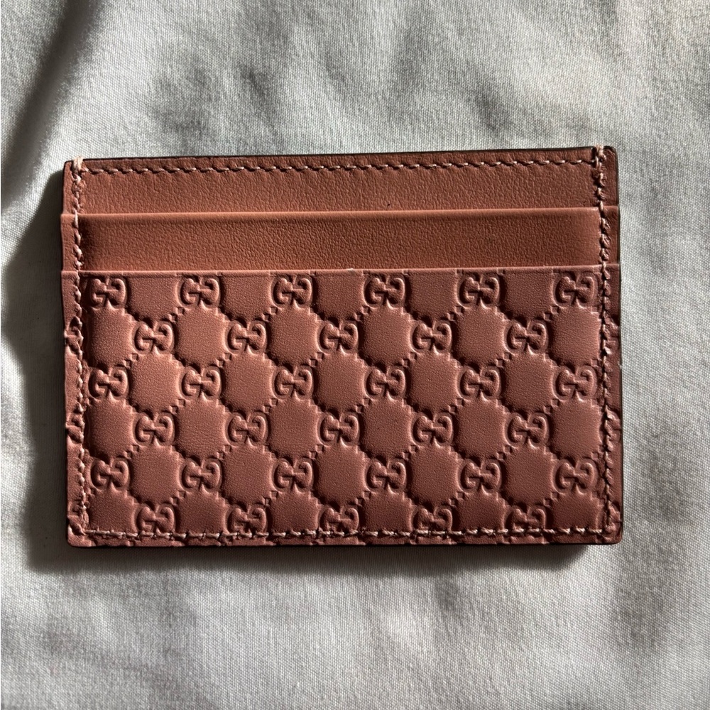 Gucci leather card wallet.